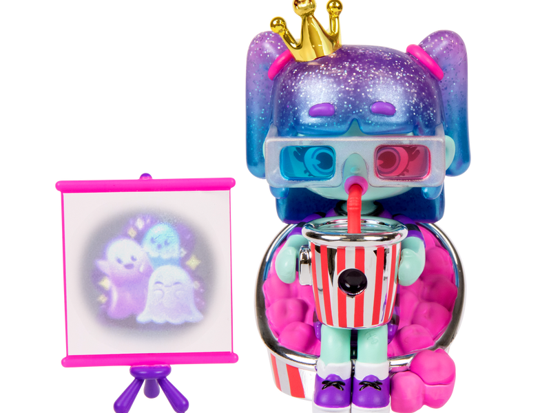 Mystery Kweenies Fearless Figurine sipping on a soda with 3D glasses on. 